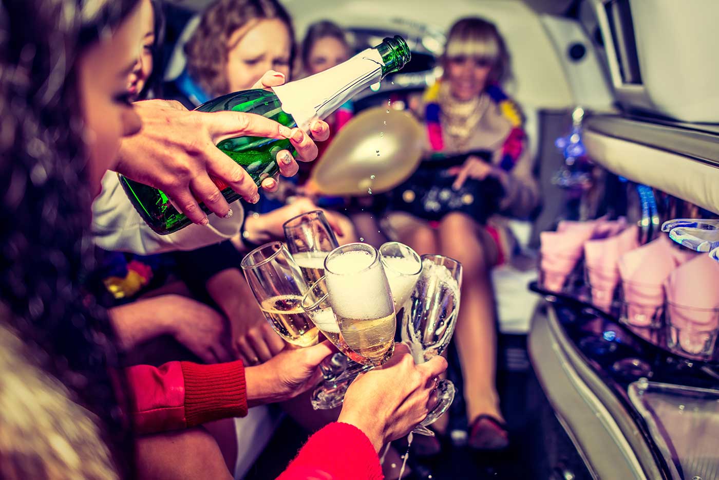 A group of women toasting with champagne